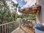 Deck with Dining Table and BBQ Grill Overlooking Golf Course at 220 Evian